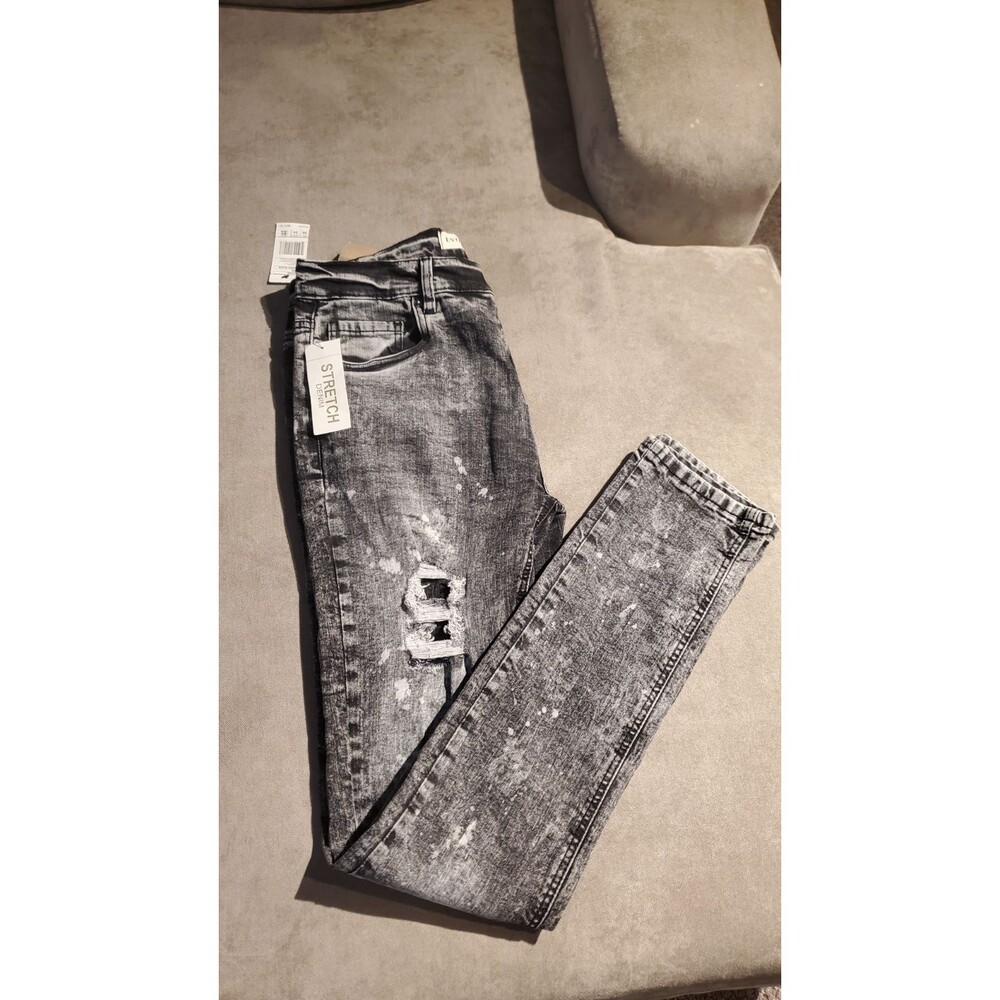 Evolution in design men ripped jeans/Streach denim